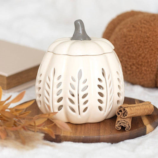 Brûleur d'huile et chauffe-cire en forme de feuille d'automne découpée en crème et citrouille.